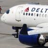 More aviation news continued on Monday after a faulty software update caused a worldwide technology outage and resulted in several flights being grounded, but the number of flights affected by it is decreasing.  Here, a Delta Air Lines flight leaves the gate on Friday at Logan International Airport in Boston.