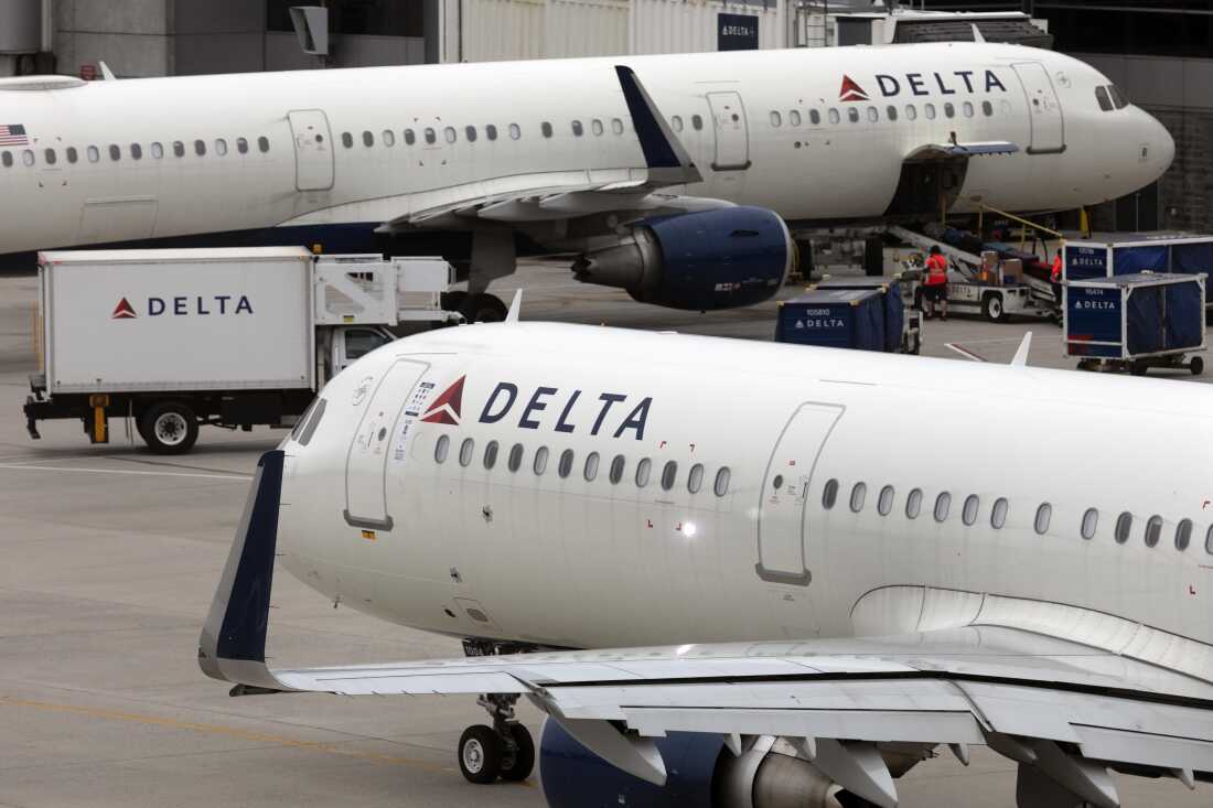 US airline regulators opened an investigation into Delta Air Lines, which is struggling to restore operations on Tuesday, more than four full days after a faulty software update caused technology chaos around the world and disrupting flights around the world.  Here, a Delta Air Lines flight leaves the gate on July 12, 2021, at Logan International Airport, Boston.